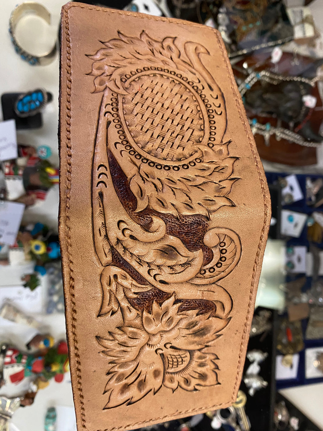 Leather tooled light colored wallet