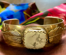 Load image into Gallery viewer, White Buffalo Cuff - stamped with arrow and feather design
